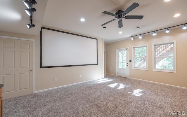10625 Pine Needle Cir, Rolla, MO 65401 - home theater room featuring a ceiling fan, carpet, baseboards, recessed lighting, and rail lighting
