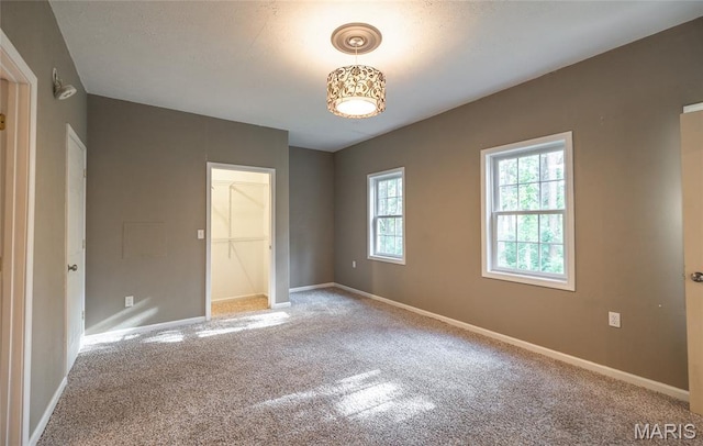 10625 Pine Needle Cir, Rolla, MO 65401 - unfurnished bedroom featuring carpet floors, baseboards, and a closet
