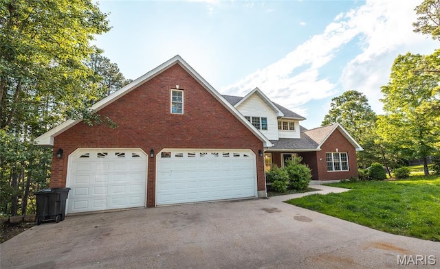 10625 Pine Needle Cir, Rolla, MO 65401 - traditional home featuring brick siding, concrete driveway, a front yard, and a garage