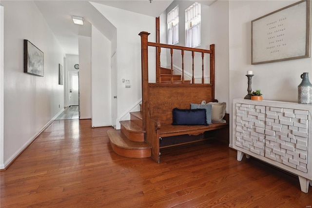 3944 Russell Blvd, Saint Louis, MO 63110 - staircase featuring wood finished floors and baseboards