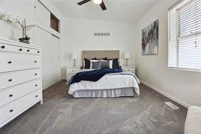 3944 Russell Blvd, Saint Louis, MO 63110 - carpeted bedroom featuring baseboards and a ceiling fan