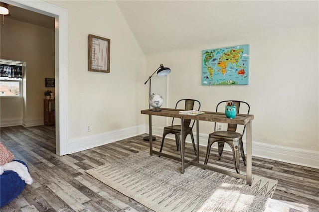 3944 Russell Blvd, Saint Louis, MO 63110 - home office featuring baseboards, wood finished floors, and vaulted ceiling
