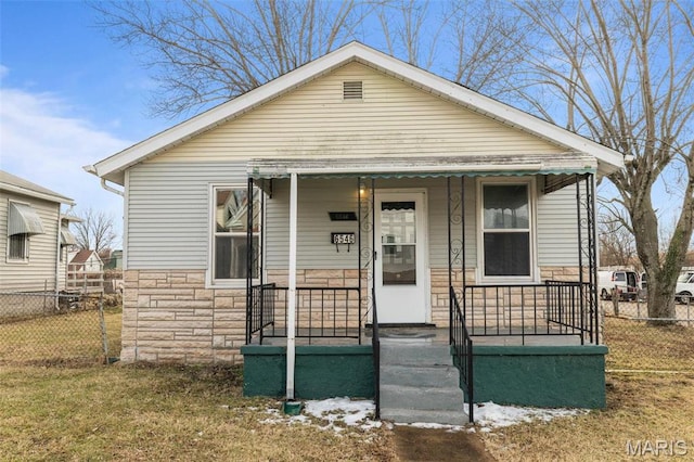 6546 Joseph Ave, Saint Louis, MO 63133 - view of front of house featuring stone siding and covered porch
