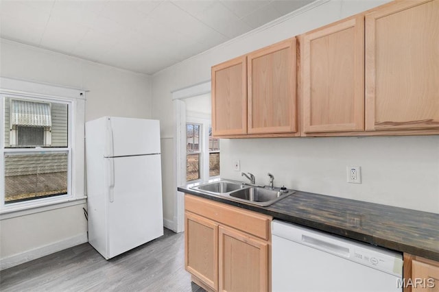 6546 Joseph Ave, Saint Louis, MO 63133 - kitchen featuring white appliances, a sink, light brown cabinets, dark countertops, and ornamental molding
