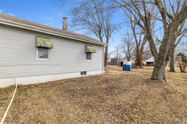6546 Joseph Ave, Saint Louis, MO 63133 - view of side of home with a chimney