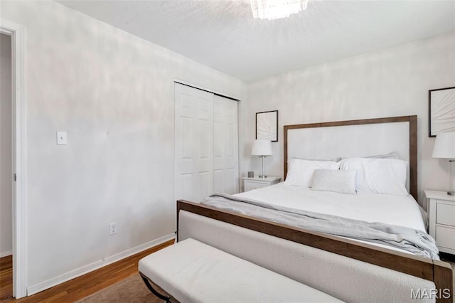 1680 Layven Ave, Florissant, MO 63031 - bedroom featuring wood finished floors and a closet