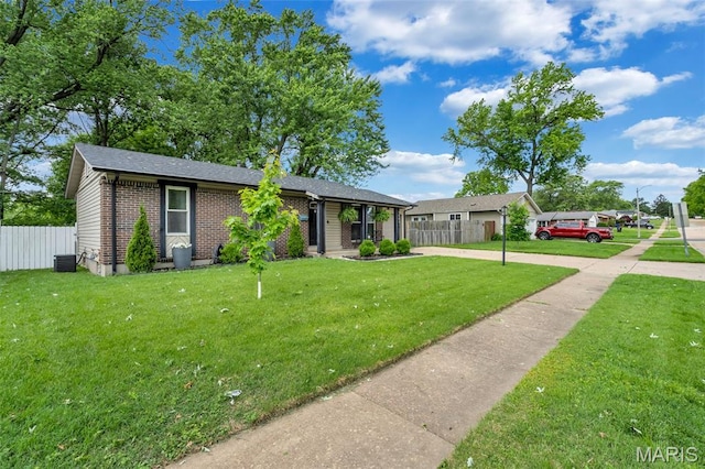 1680 Layven Ave, Florissant, MO 63031 - view of front of house with brick siding and concrete driveway