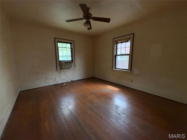 1548 Highland Ave, Alton, IL 62002 - unfurnished room featuring wood finished floors, a ceiling fan, cooling unit, and baseboards