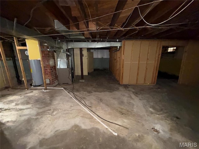 1548 Highland Ave, Alton, IL 62002 - unfinished below grade area featuring heating unit and water heater