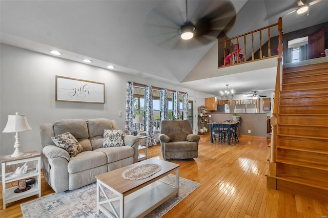 7238 State Highway D, Jackson, MO 63755 - living room with a ceiling fan, stairway, recessed lighting, light wood-type flooring, and high vaulted ceiling
