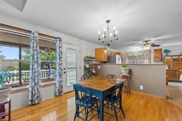 7238 State Highway D, Jackson, MO 63755 - dining area featuring light wood finished floors, a chandelier, and ceiling fan