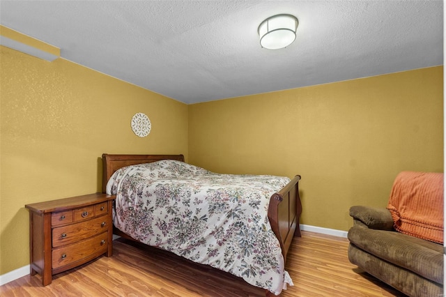 7238 State Highway D, Jackson, MO 63755 - bedroom with light wood-style floors and baseboards