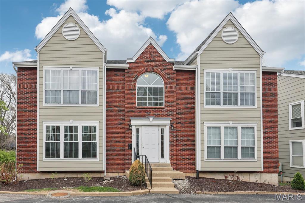 1115 Highland Oaks Ct Unit D, Ballwin, MO 63021 - view of front facade with brick siding and entry steps