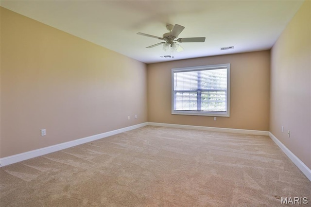 409 Country Club Vw, Edwardsville, IL 62025 - empty room with carpet, ceiling fan, and baseboards