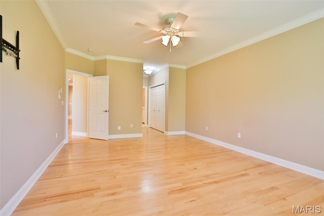 409 Country Club Vw, Edwardsville, IL 62025 - unfurnished bedroom with light wood-type flooring, crown molding, baseboards, and a closet