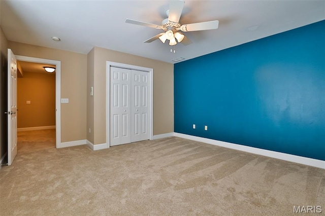 409 Country Club Vw, Edwardsville, IL 62025 - unfurnished bedroom featuring carpet flooring, a closet, ceiling fan, and baseboards