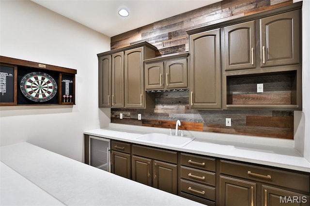 409 Country Club Vw, Edwardsville, IL 62025 - kitchen featuring a sink, light countertops, open shelves, decorative backsplash, and recessed lighting