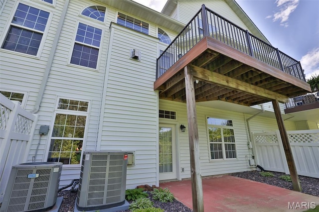 409 Country Club Vw, Edwardsville, IL 62025 - view of patio with central AC, fence, and a deck