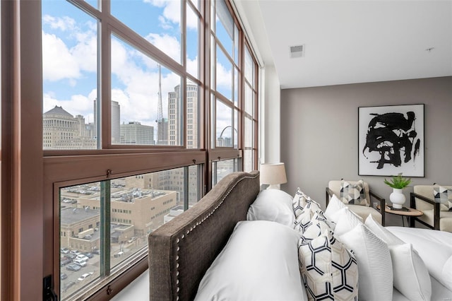 bedroom with a skyline view