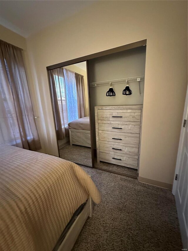 5316 Pershing Ave Unit 507, Saint Louis, MO 63112 - carpeted bedroom with a closet and baseboards