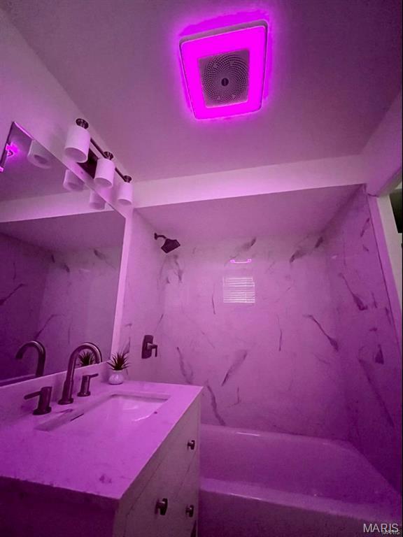 360 3rd St, Ellington, MO 63638 - full bath featuring vanity and washtub / shower combination
