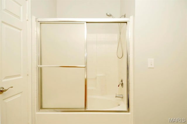 39 Kassebaum Ln Unit 303, Saint Louis, MO 63129 - bathroom with bath / shower combo with glass door