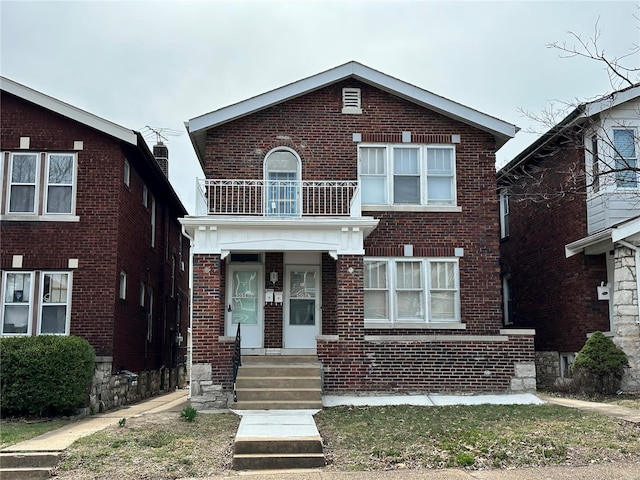 5056 Lindenwood Ave, Saint Louis, MO 63109 - view of front of home with brick siding and a balcony
