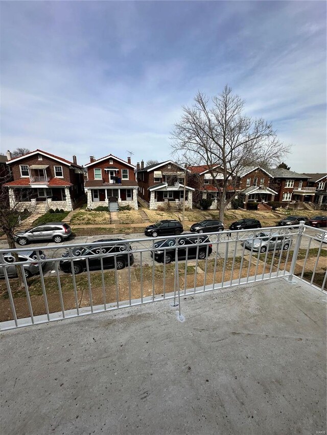 5056 Lindenwood Ave, Saint Louis, MO 63109 - view of front of property featuring a residential view and a balcony