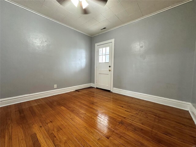 5056 Lindenwood Ave, Saint Louis, MO 63109 - unfurnished room with ornamental molding, a ceiling fan, baseboards, and dark wood finished floors