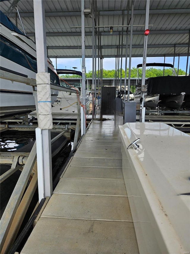 86 Aqua Fin Rd Unit 3B, Osage Beach, MO 65049 - dock area with boat lift