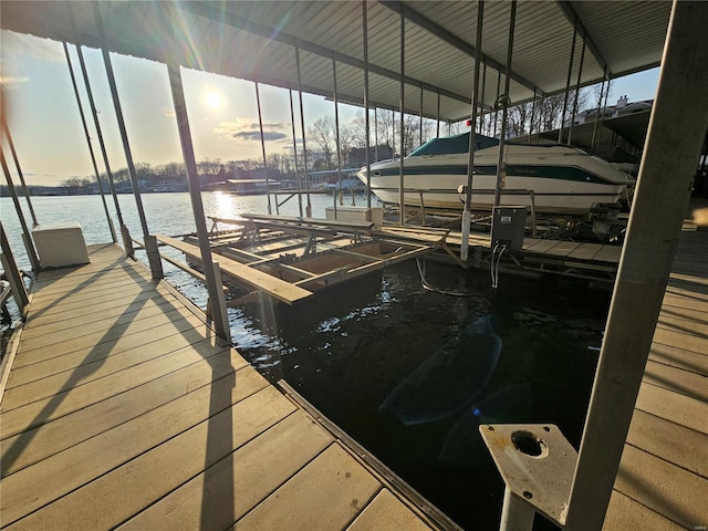 86 Aqua Fin Rd Unit 3B, Osage Beach, MO 65049 - dock featuring boat lift and a water view