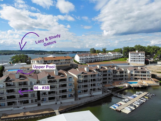86 Aqua Fin Rd Unit 3B, Osage Beach, MO 65049 - drone / aerial view of apartment complex / building and a nearby body of water