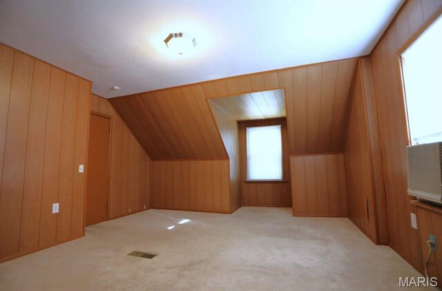 7710 Saint Albans Ave, Maplewood, MO 63117 - bonus room featuring light carpet, wooden walls, and vaulted ceiling