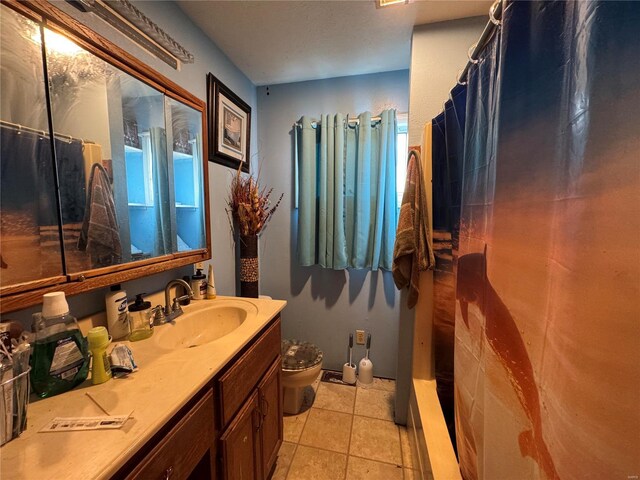 806 E 1st St, Salem, MO 65560 - full bath featuring toilet, a shower with curtain, vanity, and tile patterned flooring