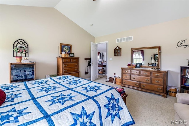 bedroom featuring carpet flooring and high vaulted ceiling