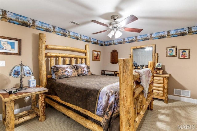 bedroom with carpet flooring, baseboards, and a ceiling fan