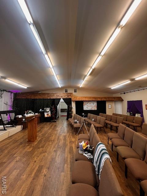 below grade area featuring wood finished floors