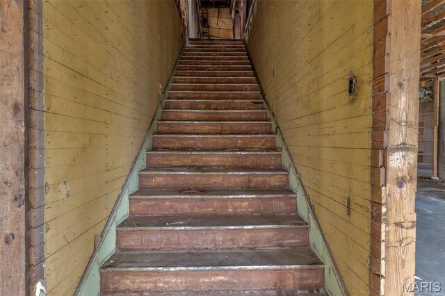 702 Benham St, Bonne Terre, MO 63628 - staircase featuring wood walls