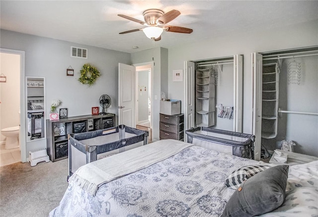 carpeted bedroom with a ceiling fan