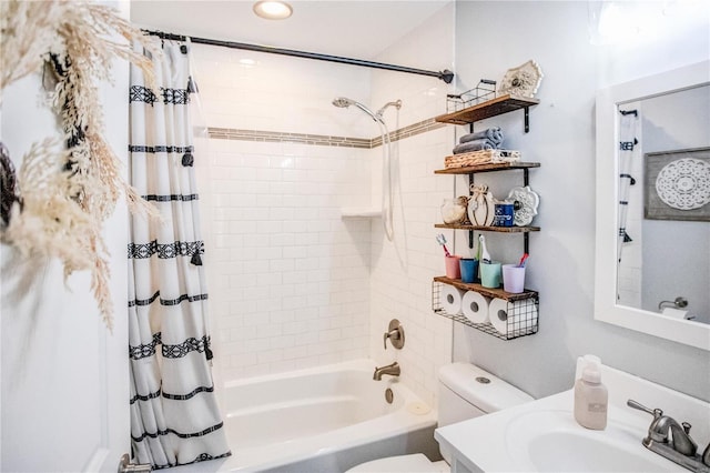 bathroom with toilet, shower / tub combo with curtain, vanity, and recessed lighting