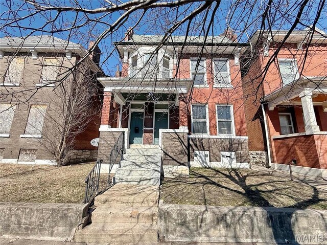 3949 Palm St, Saint Louis, MO 63107 - view of front of property with brick siding