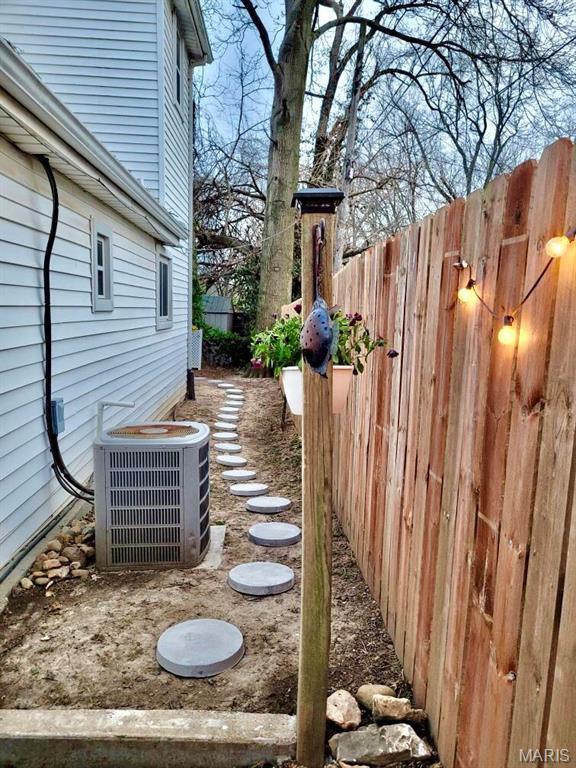 3579 Boswell, St John, MO 63114 - view of yard featuring central AC