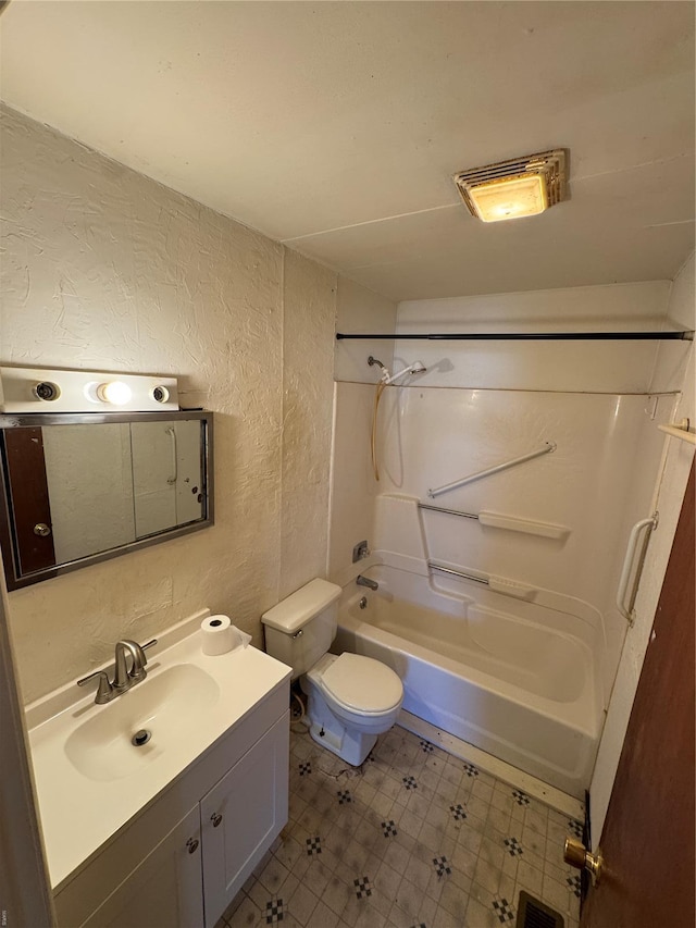 445 Manion, Sullivan, MO 63080 - full bathroom with a textured wall, toilet, bathtub / shower combination, vanity, and tile patterned floors