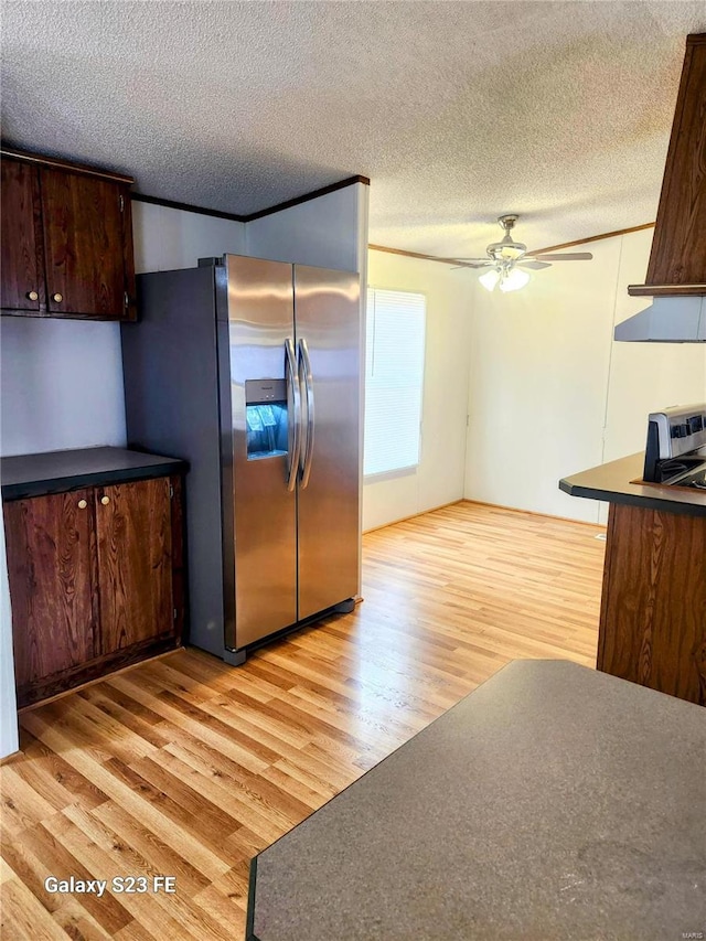 209 Sentry Oaks, Union, MO 63084 - kitchen with stainless steel refrigerator with ice dispenser, light wood-style flooring, a ceiling fan, a textured ceiling, and dark brown cabinets