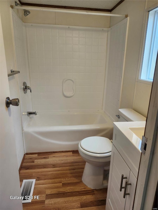 209 Sentry Oaks, Union, MO 63084 - full bathroom featuring wood finished floors, toilet, shower / tub combination, and vanity