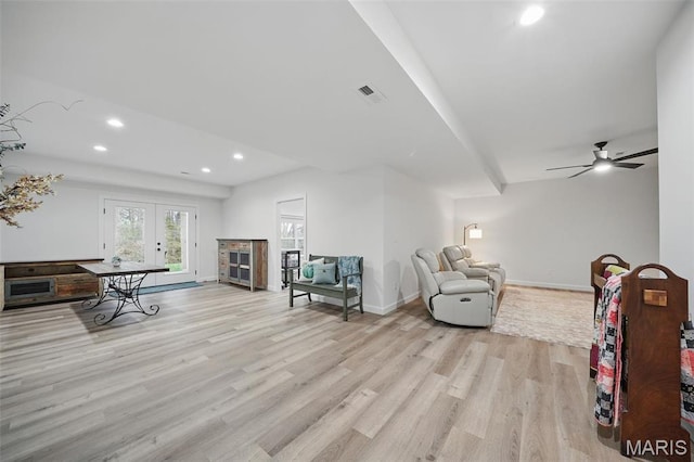 19011 Pinckney Manor Ct, Warrenton, MO 63383 - living room with light wood finished floors, recessed lighting, french doors, baseboards, and a ceiling fan