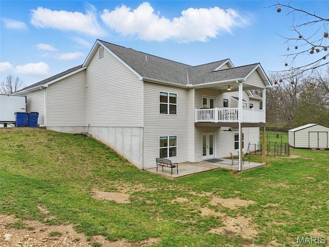 19011 Pinckney Manor Ct, Warrenton, MO 63383 - back of property with french doors, a shed, a patio area, a balcony, and a yard
