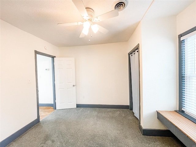 791 E Adams St, Nashville, IL 62263 - unfurnished bedroom featuring carpet flooring, baseboards, and ceiling fan