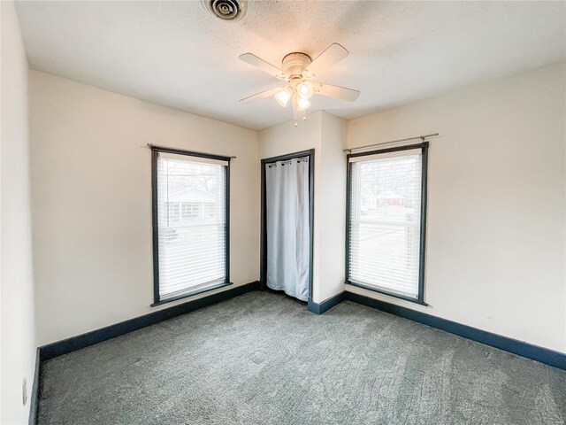 791 E Adams St, Nashville, IL 62263 - carpeted empty room with ceiling fan and baseboards