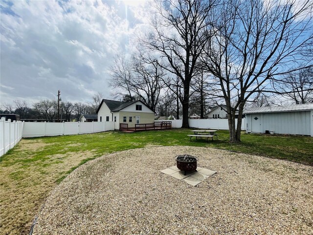 791 E Adams St, Nashville, IL 62263 - view of yard featuring an outdoor fire pit and a deck